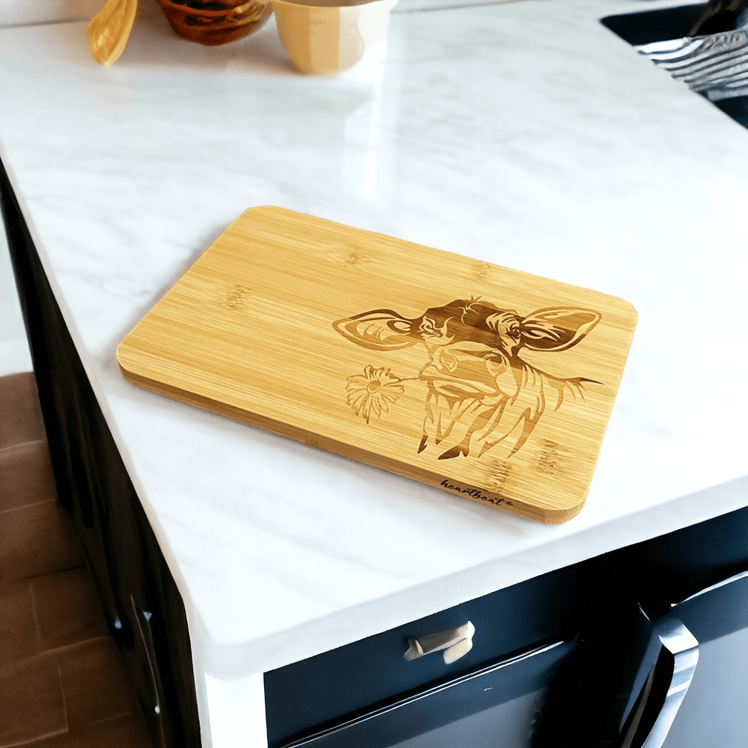Bambus Schneidbrett mit gelaserter Kuh-Gravur, Format 23×15 cm, Vorderseite